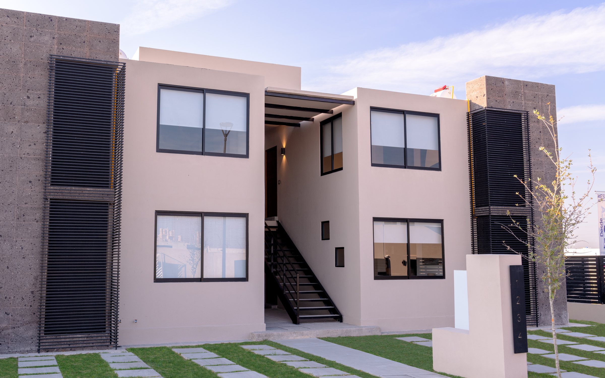 Fachada del modelo Olmo · Meseta Altta Homes